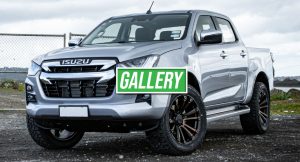 Isuzu truck with wheels standing outdoors