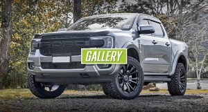 Side view of grey pickup truck fitted with alloy wheels